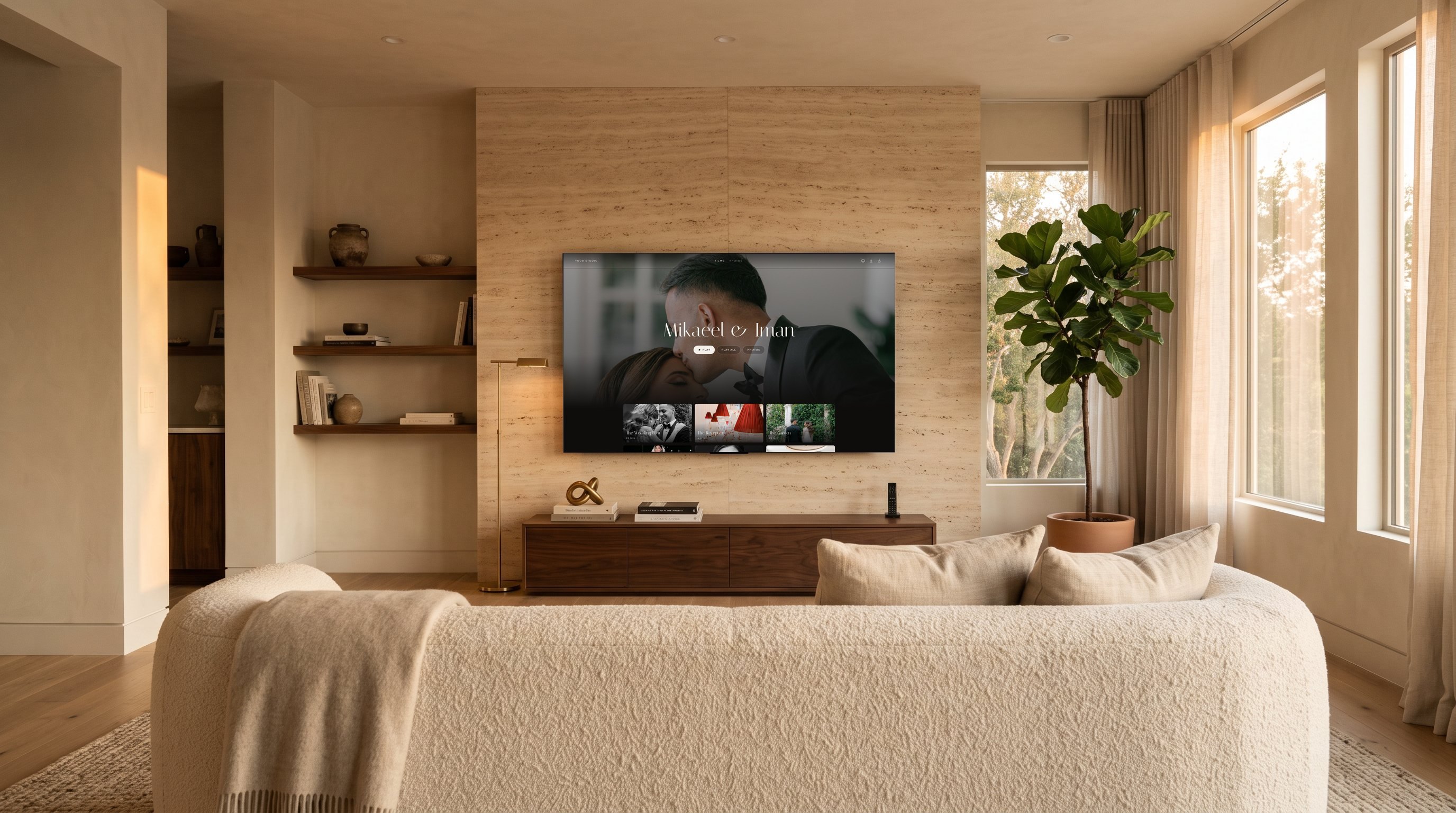 Mikaeel & Iman's wedding gallery on a 75-inch TV in a living room