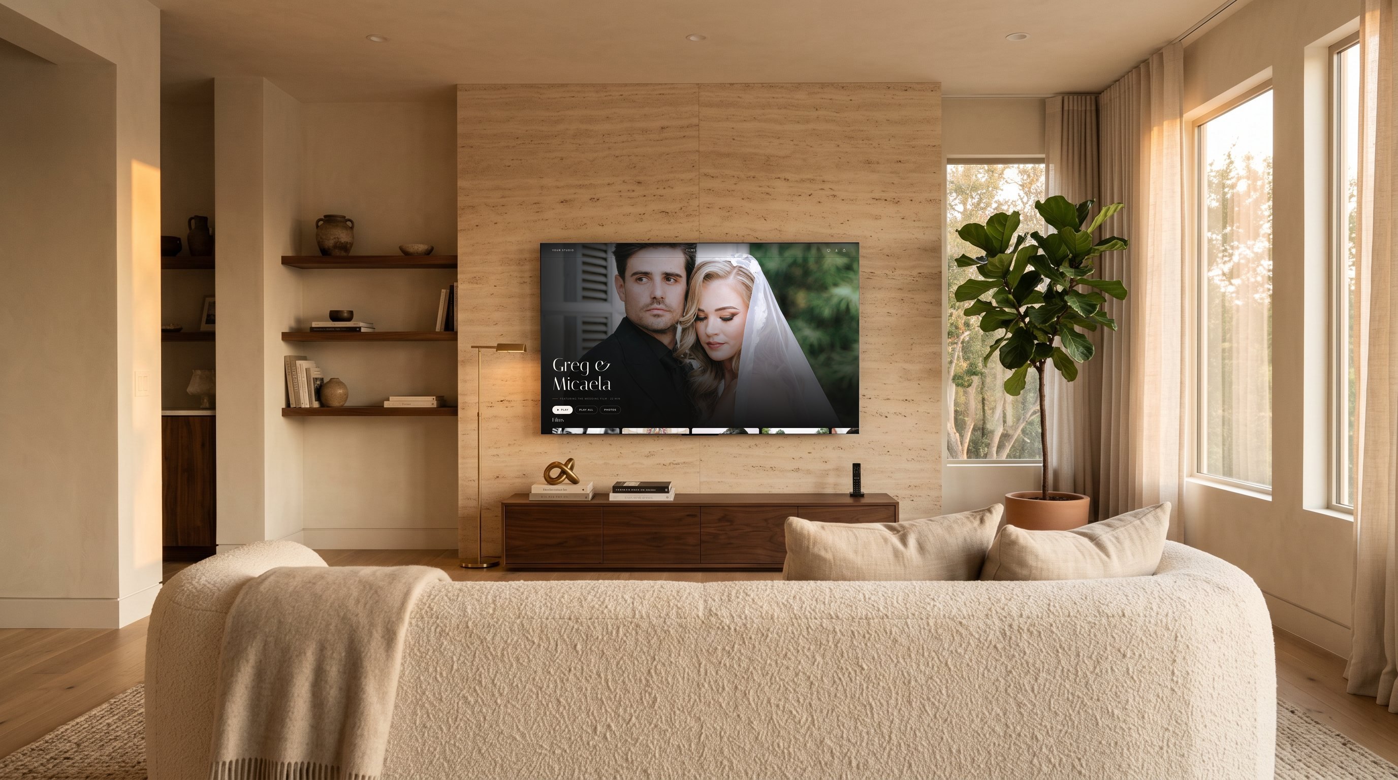 Greg & Micaela's wedding gallery on a 75-inch TV in a living room