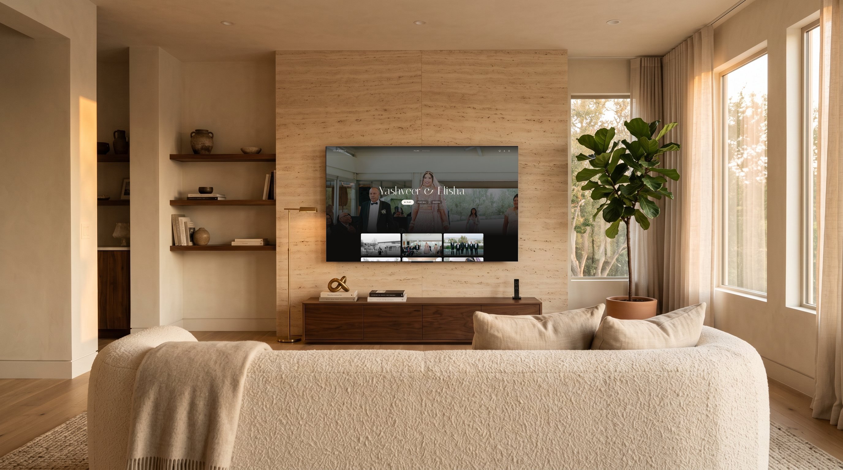 Yashveer & Elisha's wedding gallery on a 75-inch TV in a living room